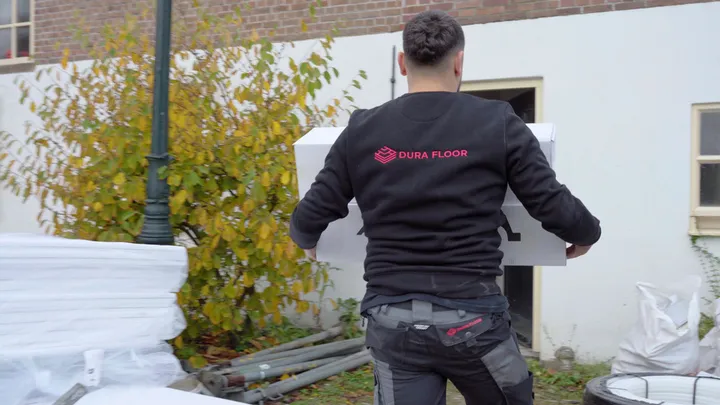 HG Vloersystemen vakman aan het werk